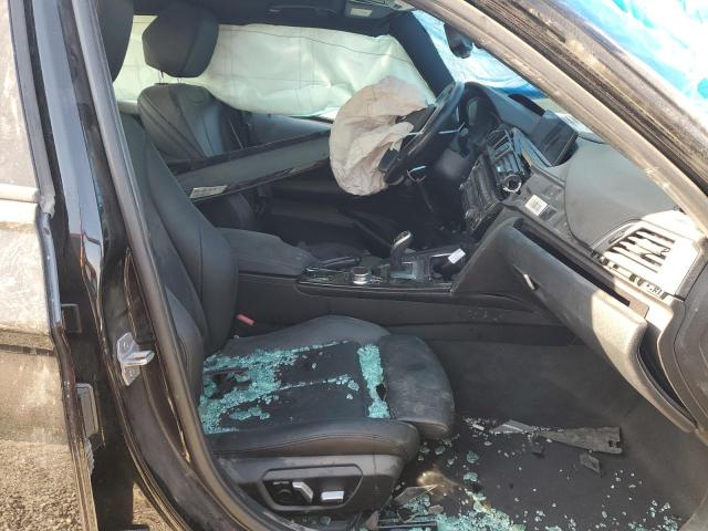 WBA8B9C57JEE82401 - 2018 BMW 330 I BLACK photo 7