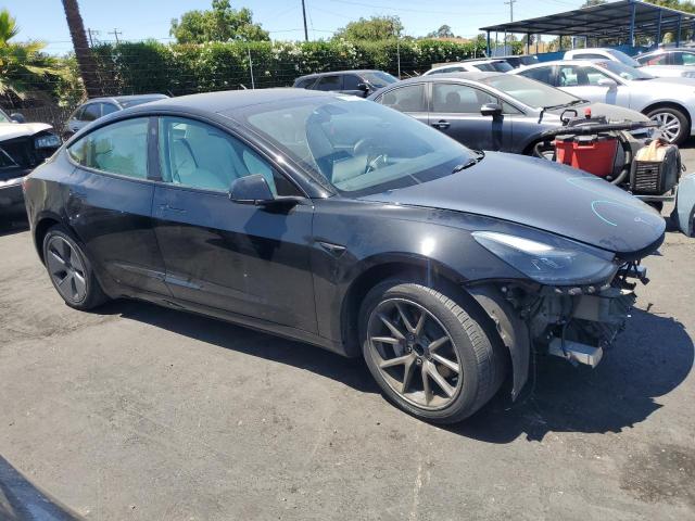 5YJ3E1EA7PF497579 - 2023 TESLA MODEL 3 BLACK photo 4