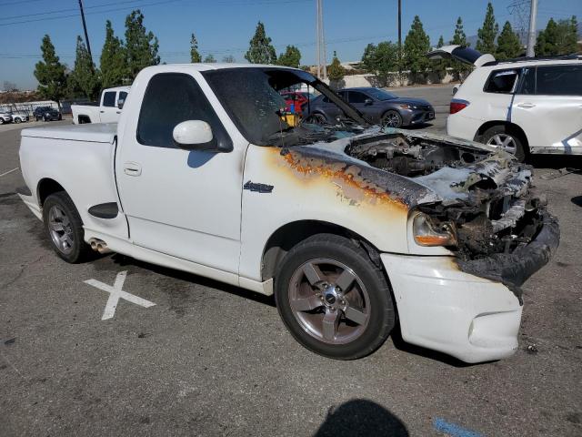 2FTZF07392CA76866 - 2002 FORD F150 SVT LIGHTNING WHITE photo 4