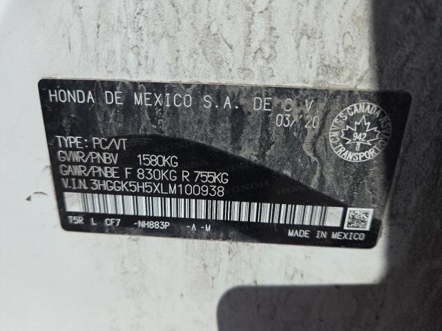 3HGGK5H5XLM100938 - 2020 HONDA FIT LX WHITE photo 12