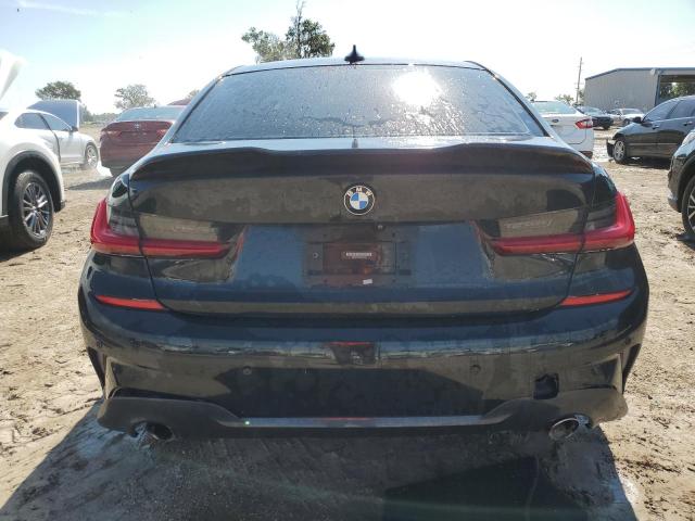 WBA5R7C59KAJ85610 - 2019 BMW 330XI BLACK photo 6