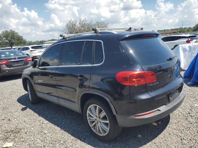 WVGAV7AX9CW529244 - 2012 VOLKSWAGEN TIGUAN S BLACK photo 2