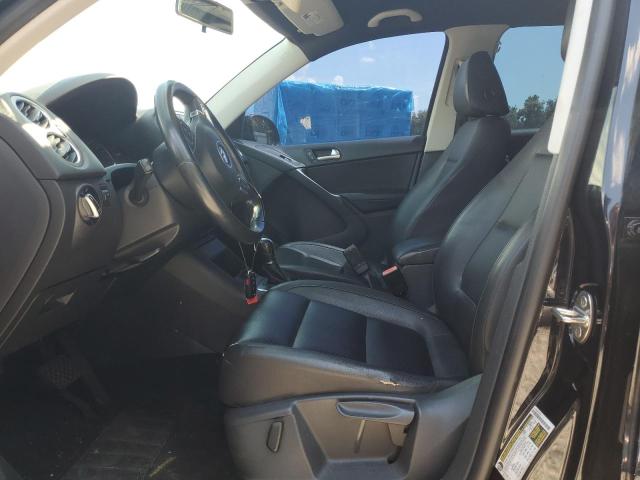 WVGAV7AX9CW529244 - 2012 VOLKSWAGEN TIGUAN S BLACK photo 7