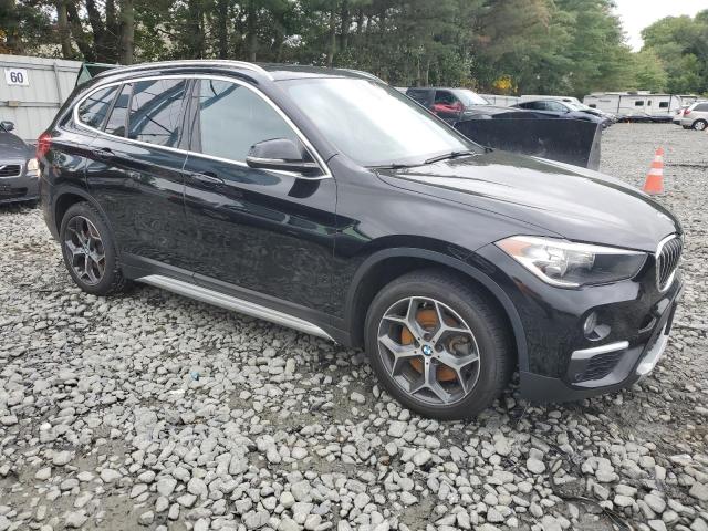WBXHT3C57K5L37745 - 2019 BMW X1 XDRIVE28I შავი ფოტო 4