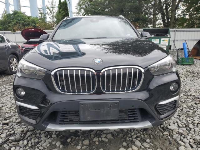 WBXHT3C57K5L37745 - 2019 BMW X1 XDRIVE28I შავი ფოტო 5