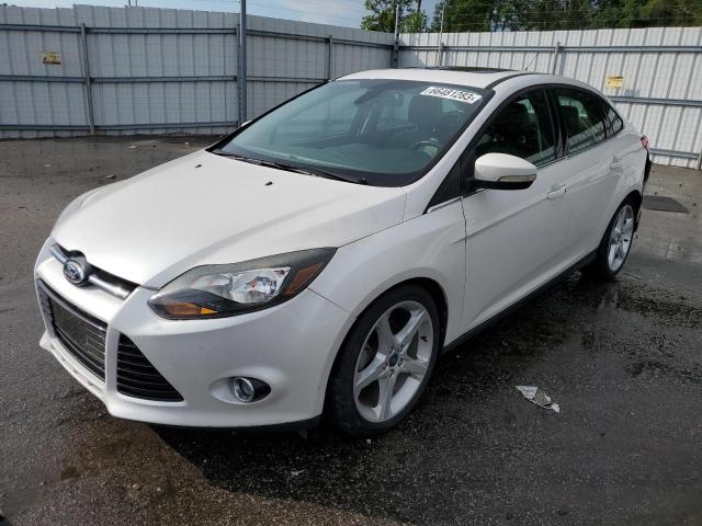 1FAHP3J24CL335898 - 2012 FORD FOCUS TITANIUM WHITE photo 1