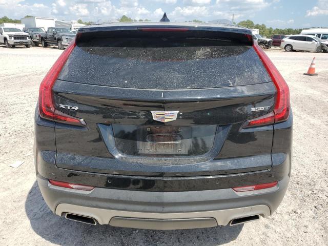 1GYFZCR44MF000183 - 2021 CADILLAC XT4 PREMIUM LUXURY BLACK photo 6