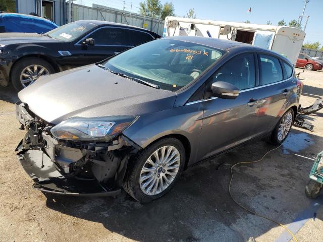 1FAHP3N22CL145088 - 2012 FORD FOCUS TITANIUM GRAY photo 1