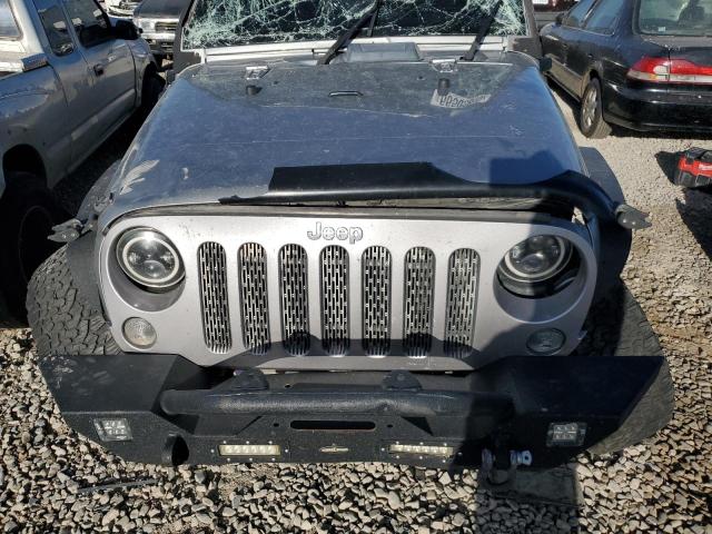 1C4BJWEG6EL107008 - 2014 JEEP WRANGLER U SAHARA GRAY photo 12