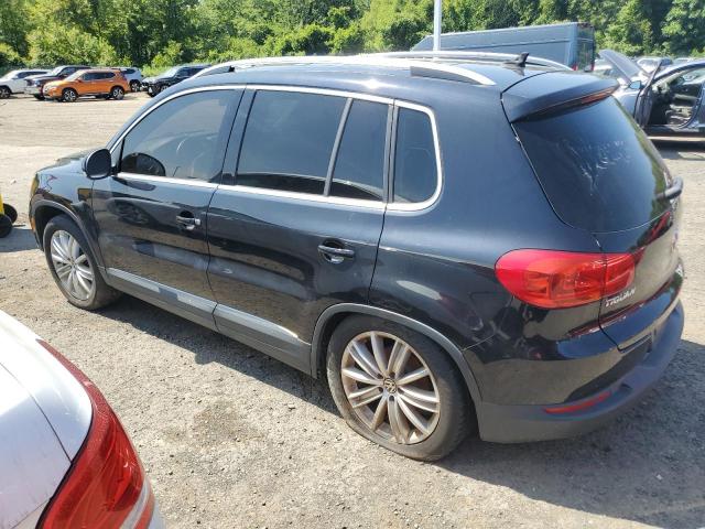 WVGBV3AX8EW532247 - 2014 VOLKSWAGEN TIGUAN S BLACK photo 2
