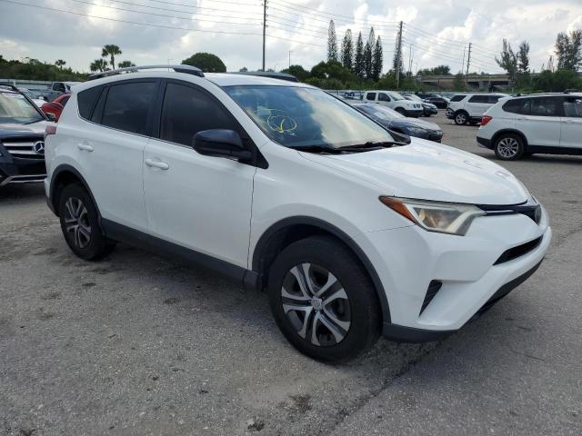 JTMZFREV1HJ702302 - 2017 TOYOTA RAV4 LE WHITE photo 4