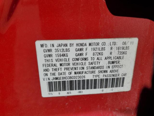 JHMGE8H33BC023026 - 2011 HONDA FIT RED photo 12