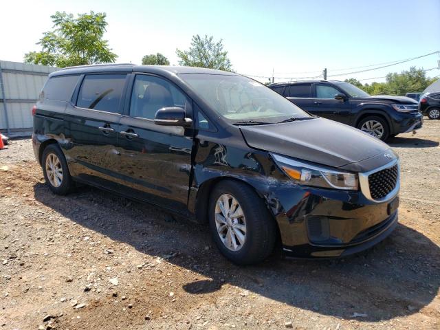 KNDMB5C18H6304876 - 2017 KIA SEDONA LX BLACK photo 4