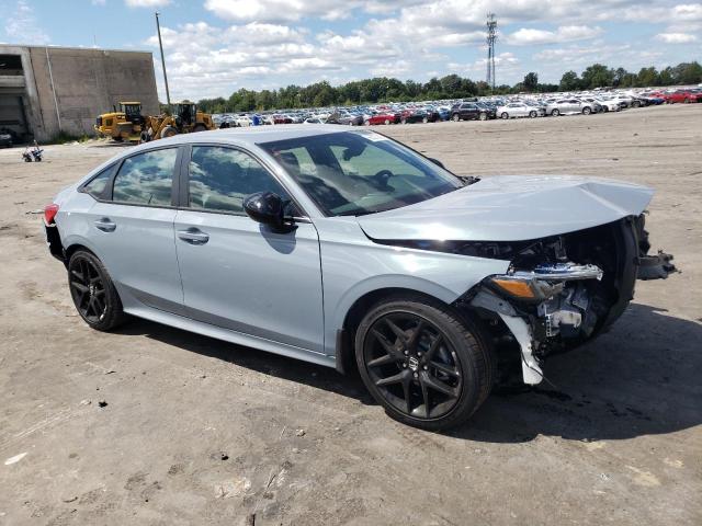 2HGFE2F52PH564248 - 2023 HONDA CIVIC SPORT BLUE photo 4