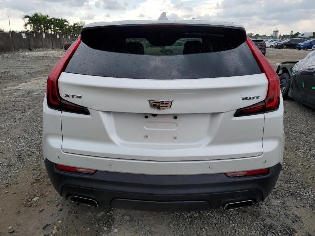 1GYAZAR41KF138310 - 2019 CADILLAC XT4 LUXURY WHITE photo 6