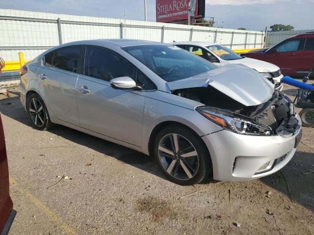 3KPFN4A88JE189741 - 2018 KIA FORTE EX SILVER photo 4