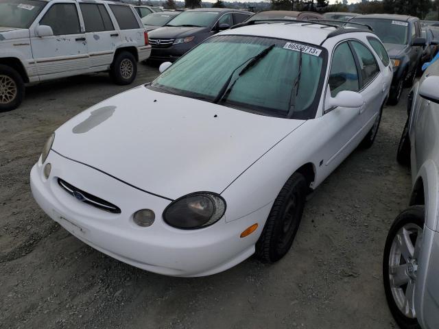 1FAFP58S7XG223782 - 1999 FORD TAURUS SE COMFORT WHITE photo 1