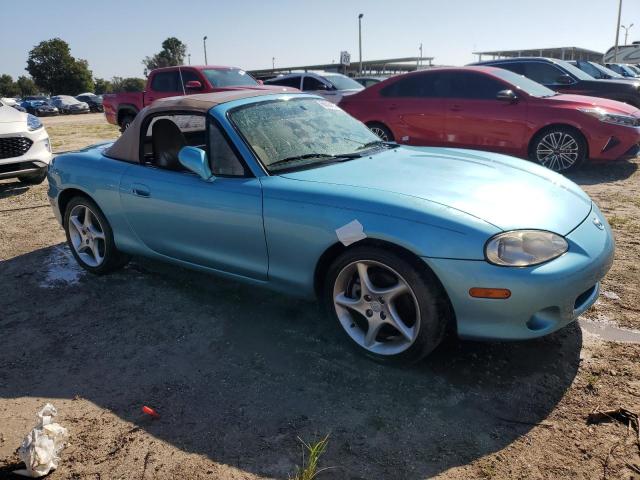 JM1NB353610211399 - 2001 MAZDA MX-5 MIATA BASE TURQUOISE photo 4