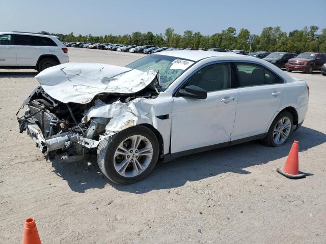 1FAHP2D89GG110563 - 2016 FORD TAURUS SE WHITE photo 1