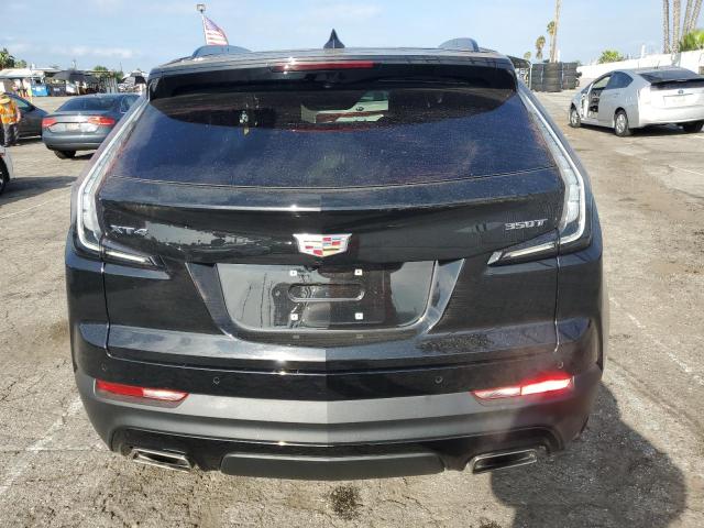 1GYFZER48PF108533 - 2023 CADILLAC XT4 SPORT BLACK photo 6