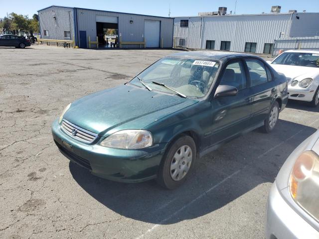 2HGEJ6613XH588215 - 1999 HONDA CIVIC BASE GREEN photo 1