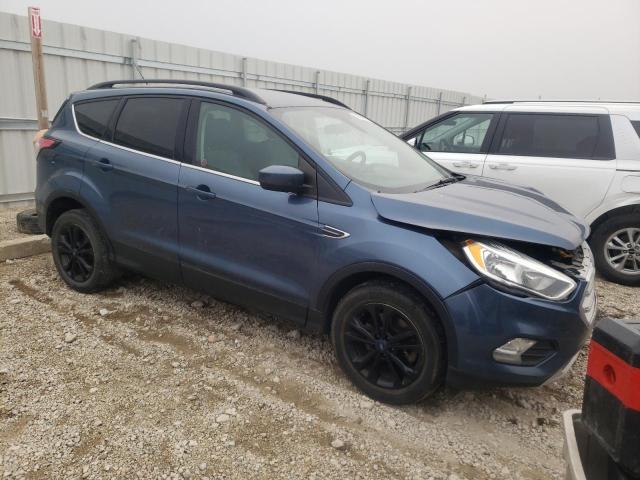 1FMCU9GD8JUA00655 - 2018 FORD ESCAPE SE BLUE photo 4