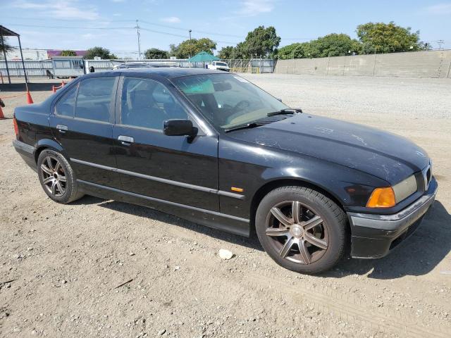 WBACC932XVEE58919 - 1997 BMW 318 I BLACK photo 4