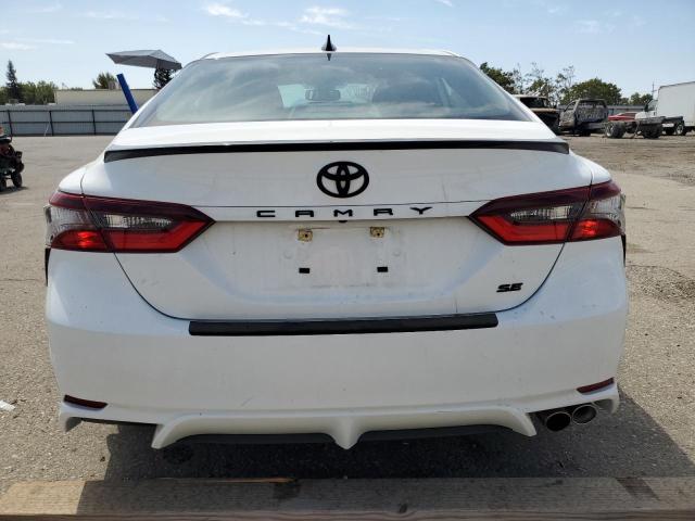 4T1T11AK9RU208282 - 2024 TOYOTA CAMRY SE NIGHT SHADE WHITE photo 6