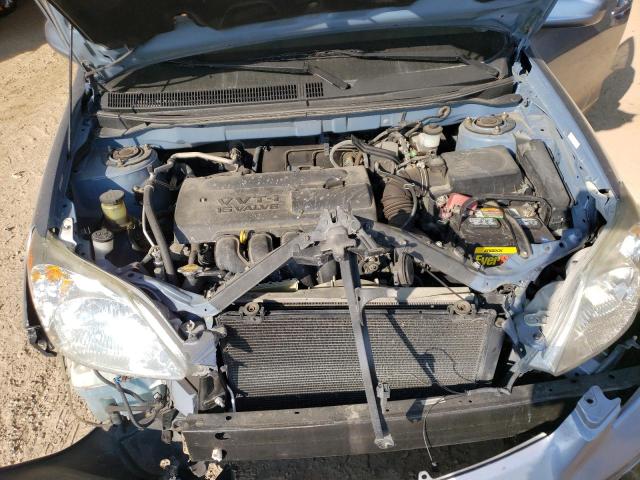 2T1KR32E93C014868 - 2003 TOYOTA COROLLA MA XR TURQUOISE photo 11