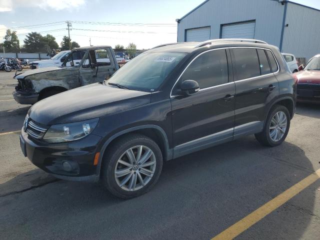 WVGBV7AX9CW548767 - 2012 VOLKSWAGEN TIGUAN S BLACK photo 1