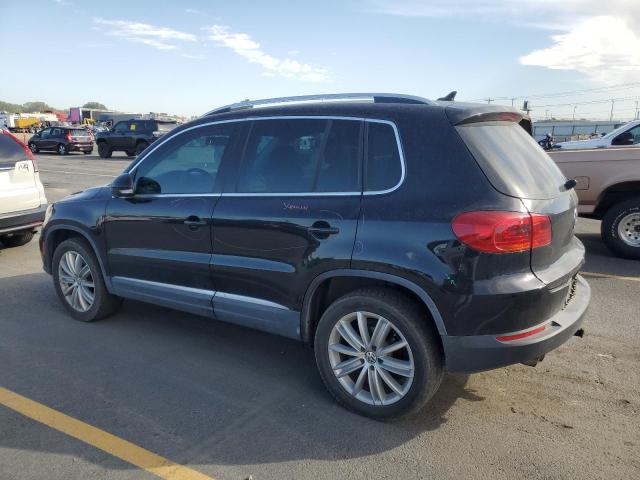 WVGBV7AX9CW548767 - 2012 VOLKSWAGEN TIGUAN S BLACK photo 2