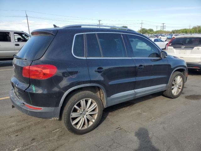 WVGBV7AX9CW548767 - 2012 VOLKSWAGEN TIGUAN S BLACK photo 3