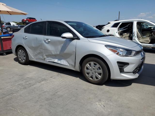 3KPA24AD6PE581349 - 2023 KIA RIO LX SILVER photo 4