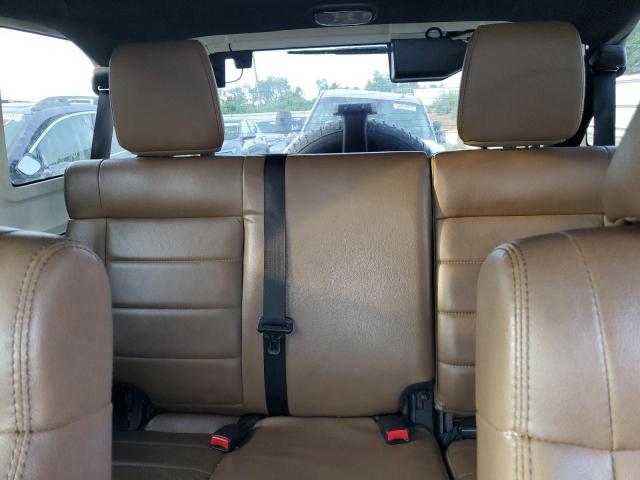 1C4BJWEG0CL274977 - 2012 JEEP WRANGLER U SAHARA Արծաթագույն լուսանկար 10