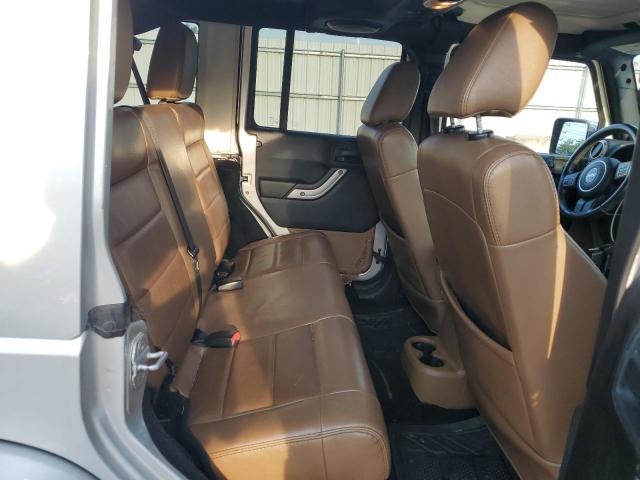1C4BJWEG0CL274977 - 2012 JEEP WRANGLER U SAHARA Արծաթագույն լուսանկար 11
