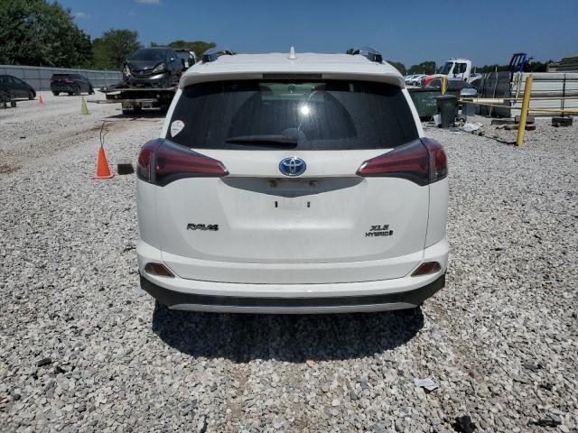 JTMRJREV3GD018444 - 2016 TOYOTA RAV4 HV XLE WHITE photo 6