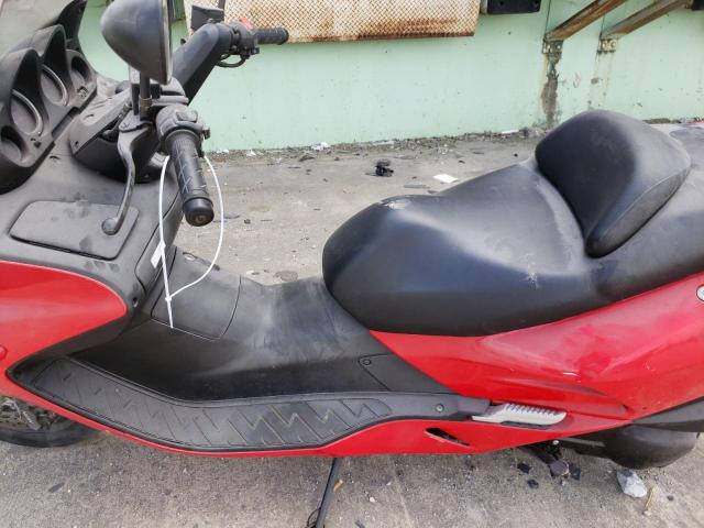 JH2MF06184K201078 - 2004 HONDA NSS250 RED photo 10