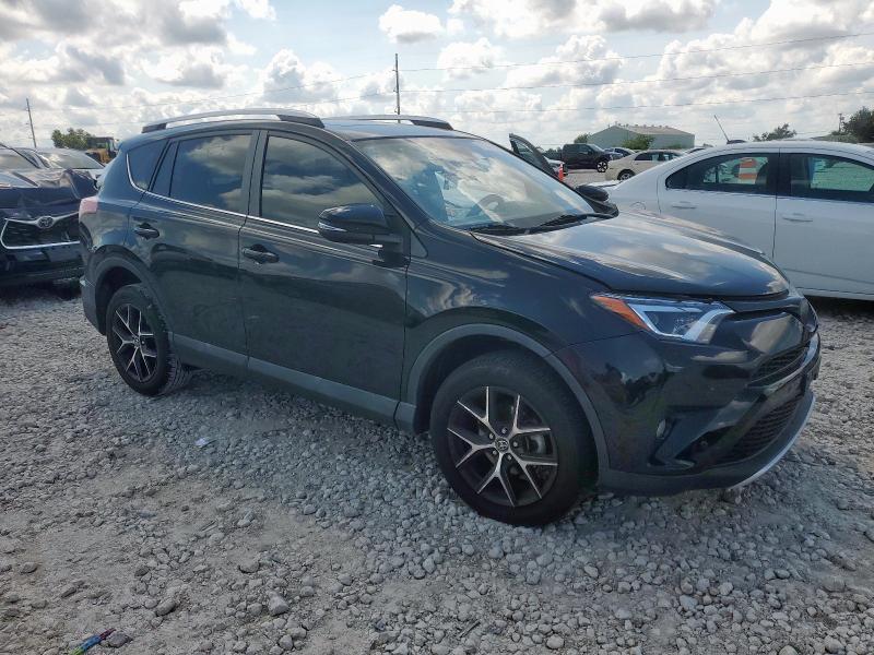 2T3NFREV8GW281886 - 2016 TOYOTA RAV4 SE BLACK photo 4