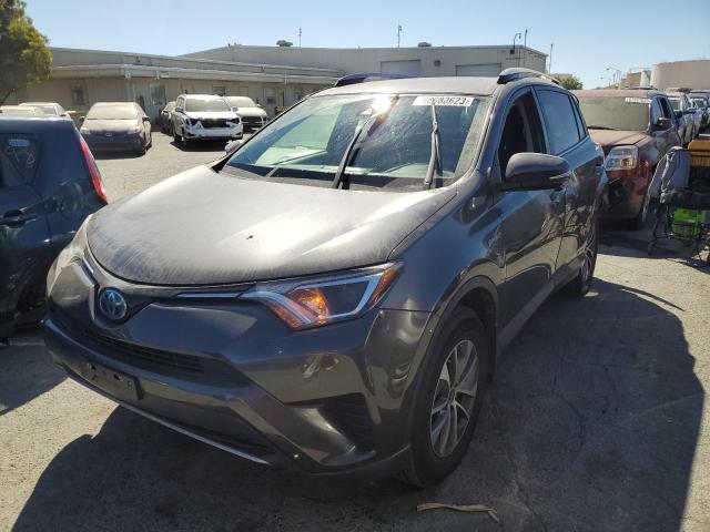 JTMRJREV8JD175720 - 2018 TOYOTA RAV4 HV LE GRAY photo 1