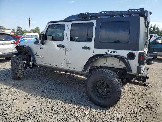 1J4BA3H17AL114995 - 2010 JEEP WRANGLER UNLIMITED SPORT SILVER photo 2