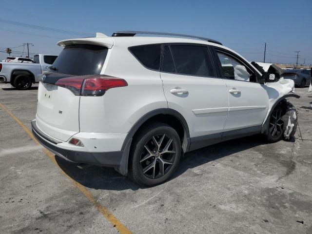 JTMNFREV3JD119474 - 2018 TOYOTA RAV4 SE WHITE photo 3