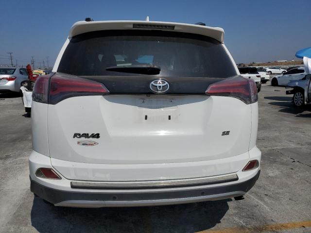 JTMNFREV3JD119474 - 2018 TOYOTA RAV4 SE WHITE photo 6