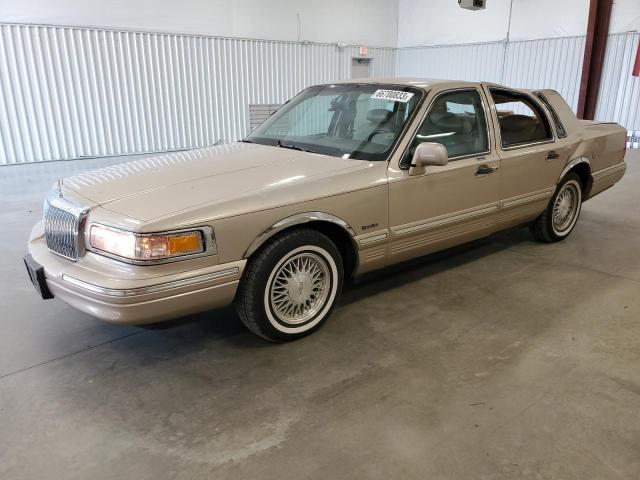 1LNLM82W9VY732472 - 1997 LINCOLN TOWN CAR SIGNATURE GOLD photo 1