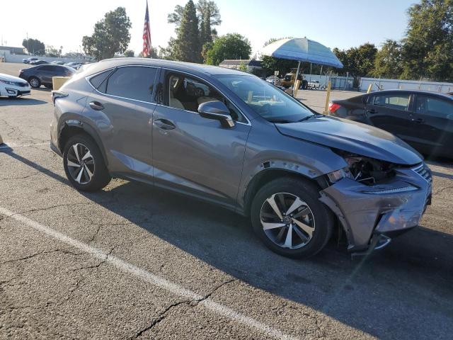 JTJGJRDZ9M2166047 - 2021 LEXUS NX 300H BASE GRAY photo 4