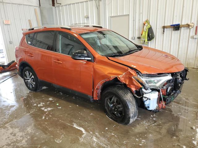 2T3BFREV5GW500676 - 2016 TOYOTA RAV4 LE ORANGE photo 4