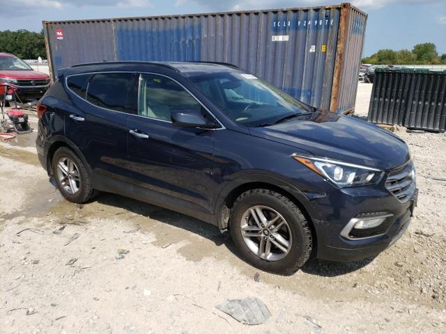 5NMZUDLB8HH045344 - 2017 HYUNDAI SANTA FE S BLUE photo 4