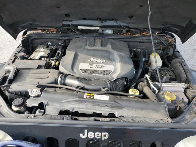 1C4HJWEG7CL219713 - 2012 JEEP WRANGLER U SAHARA Noir photo 12