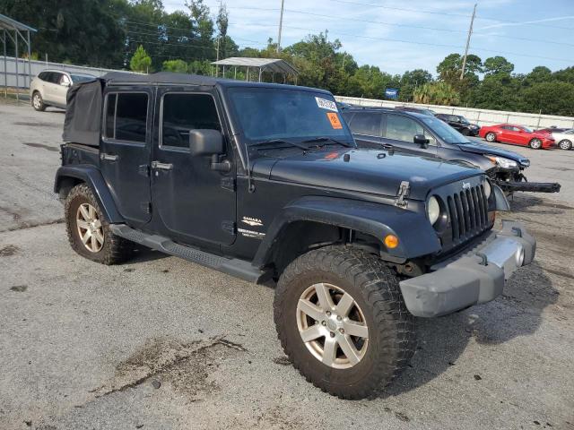 1C4HJWEG7CL219713 - 2012 JEEP WRANGLER U SAHARA Noir photo 4