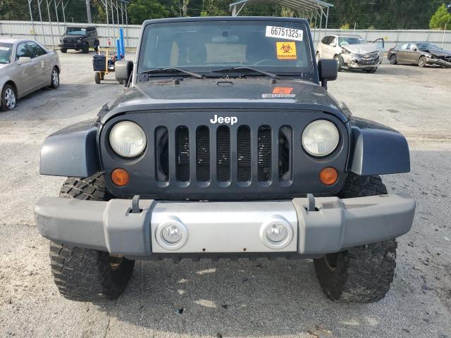 1C4HJWEG7CL219713 - 2012 JEEP WRANGLER U SAHARA Noir photo 5