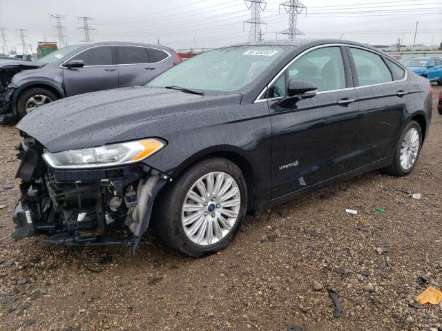 3FA6P0LU5GR184288 - 2016 FORD FUSION SE HYBRID BLACK photo 1